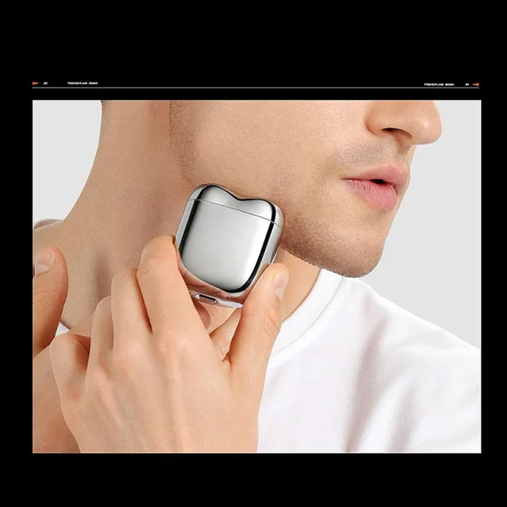 Hygienisk elektrisk barbermaskin for menn, vanntett for renslighet og kompakt for personlig pleie.