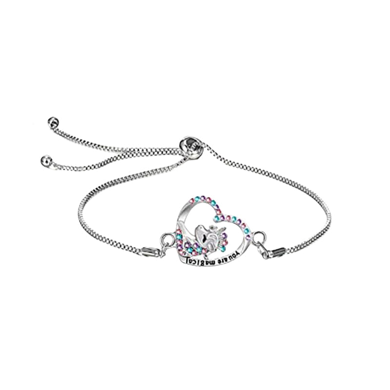 Jente armbånd og ring med enhjørning-tema. Magiske smykker med glitter for bursdagsgave.