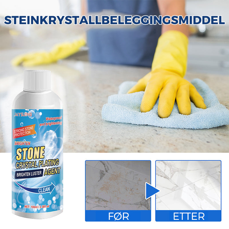 Flaske med steinflekkfjerner og svamp, klar for grundig husvask og steinpleie.