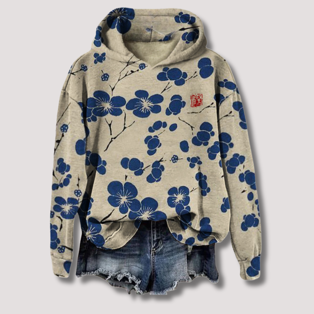 Moteriktig langermet hettegenser for dame med relaxed fit og lettvekt stoff. Ideell for fritid.