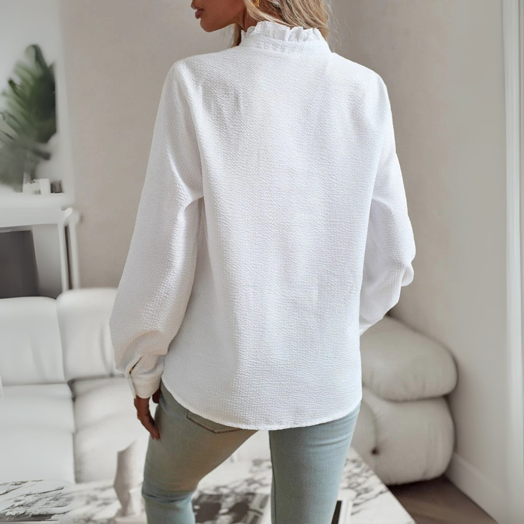 Tidløs langermet bluse. Elegant og komfortabel skjorte for kvinner, perfekt for en moderne og allsidig garderobe.