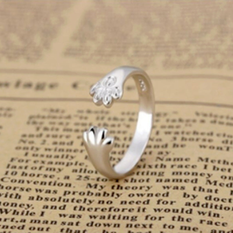 Kjæledyr-inspirert justerbar ring. Unisex design med en søt dyrepote. Flott gave til dyrevenn.