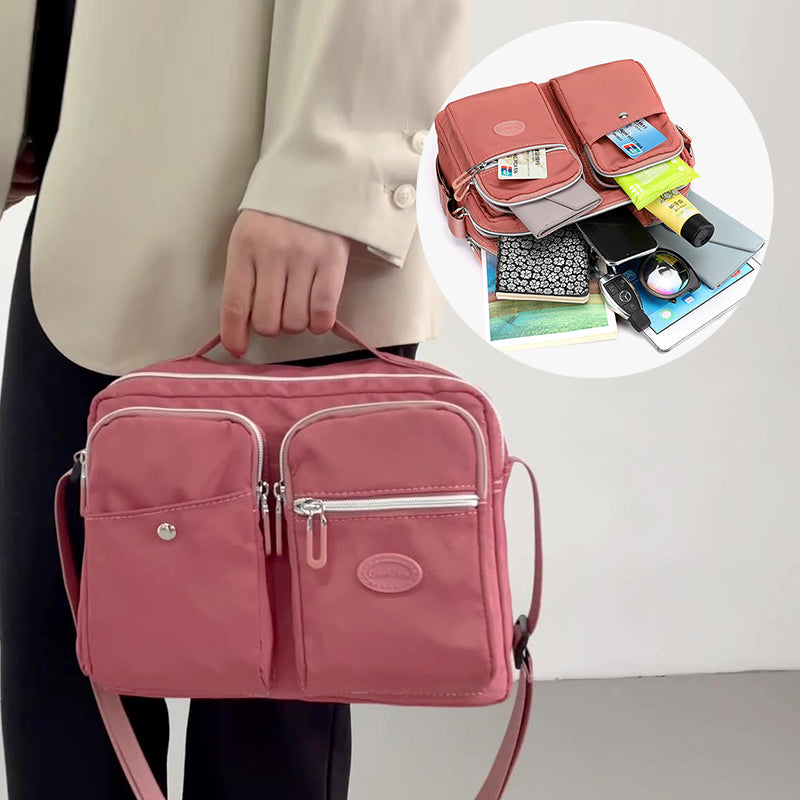 Lettvekts messenger bag i nylon, ideell for daglig organisering og lett å bære.