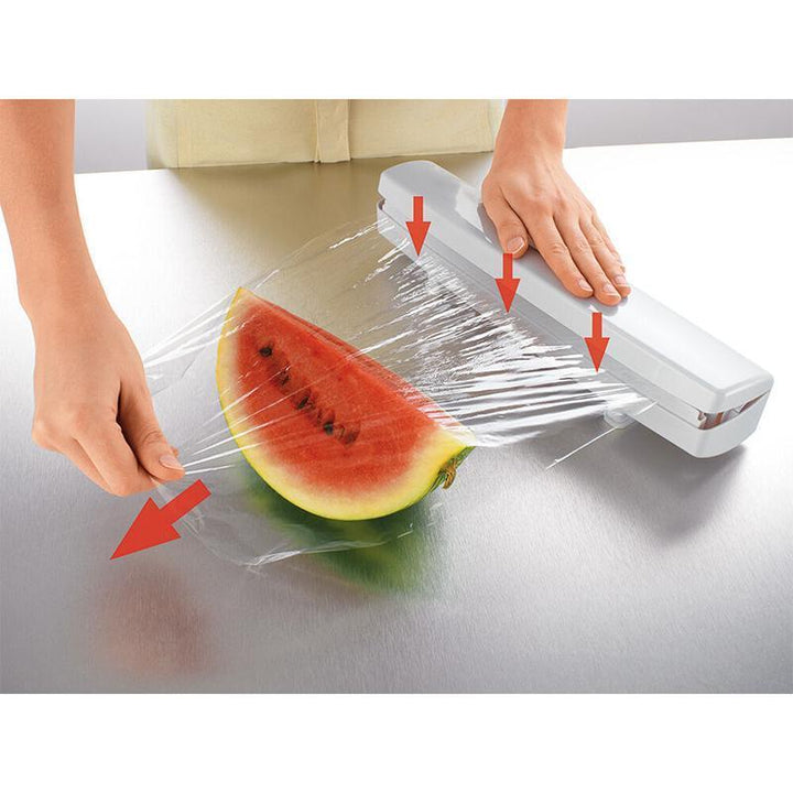Lei av krøllete folie? Denne smarte foliedispenseren med kutter sikrer jevne kutt for plastfolie og aluminiumsfolie.