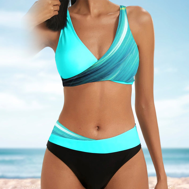 Kvinner stripet bikini og solsikke-mønster. 2-delt badedrakt for en chic look på sommerstranden.