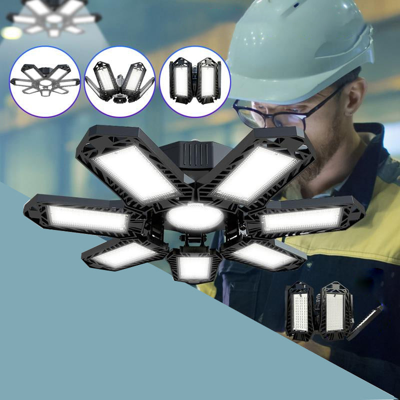 Lyssterk LED garasjelampe med justerbare paneler for optimal belysning i verksted.