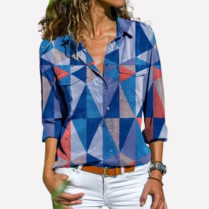 Mote-riktig feminin topp med korte ermer, en allround bluse for sommeren.