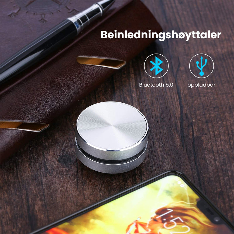 Slank profil av mini beinkonduksjonshøyttaler. Ultrabærbar Bluetooth-lyd for alle anledninger.