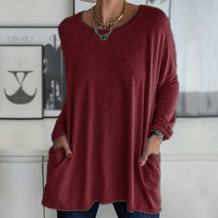 Stilig, langermet dame topp, ensfarget, rund hals, løs passform, allsidig for kvinner.