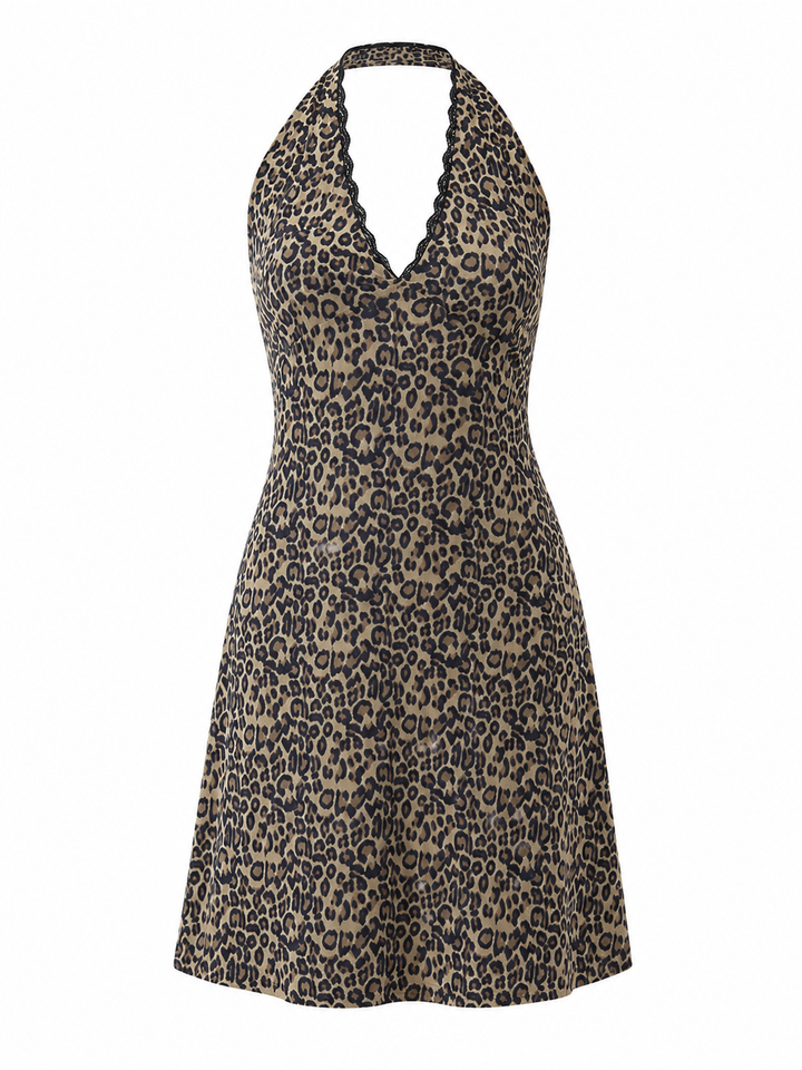 Dame minikjole i leopardmønster. Chic halterneck-kjole med blonder, ideell som sommer- eller festkjole.