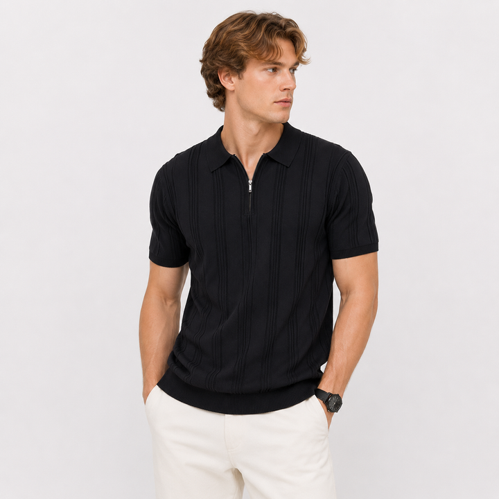 Detaljert tekstur av jacquard stoffet på herre strikket polo. Vintage look med glidelås.