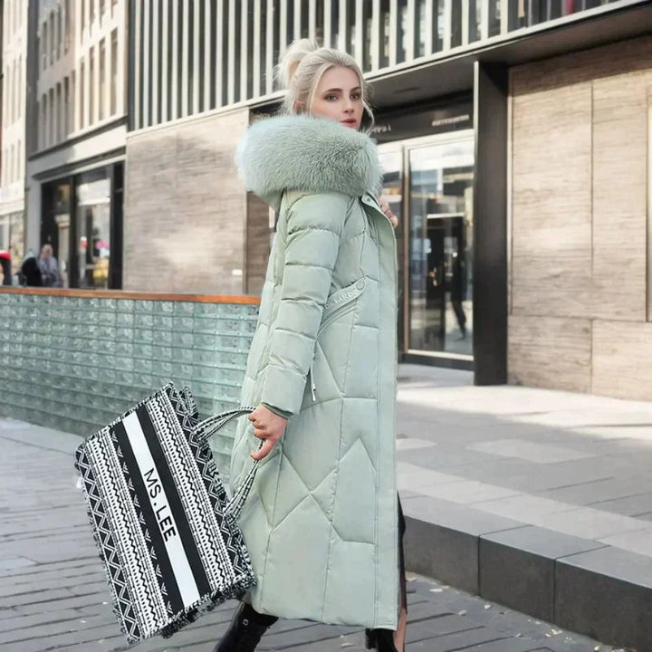 Elegant dame fuskepelskåpe for vinteren, lang og varmt yttertøy i mote.