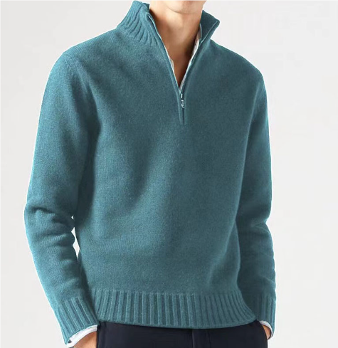 Essensiell menns rullehalsgenser i ensfarget design. Allsidig og lett å style.