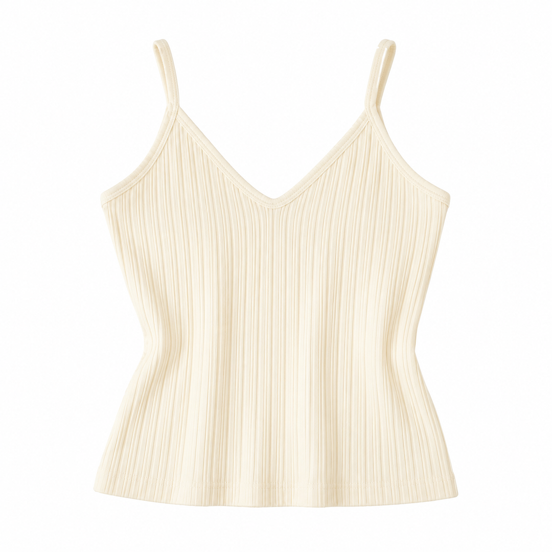 Komfortabel ermeløs strikket crop topp i aprikos for dame. Trendy V-hals og åpen rygg, perfekt for sommer.