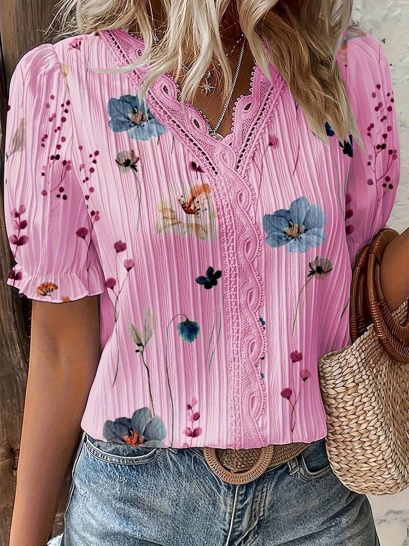 Stilig V-hals damebluse som passer like godt til hverdags som til elegante festanledninger.