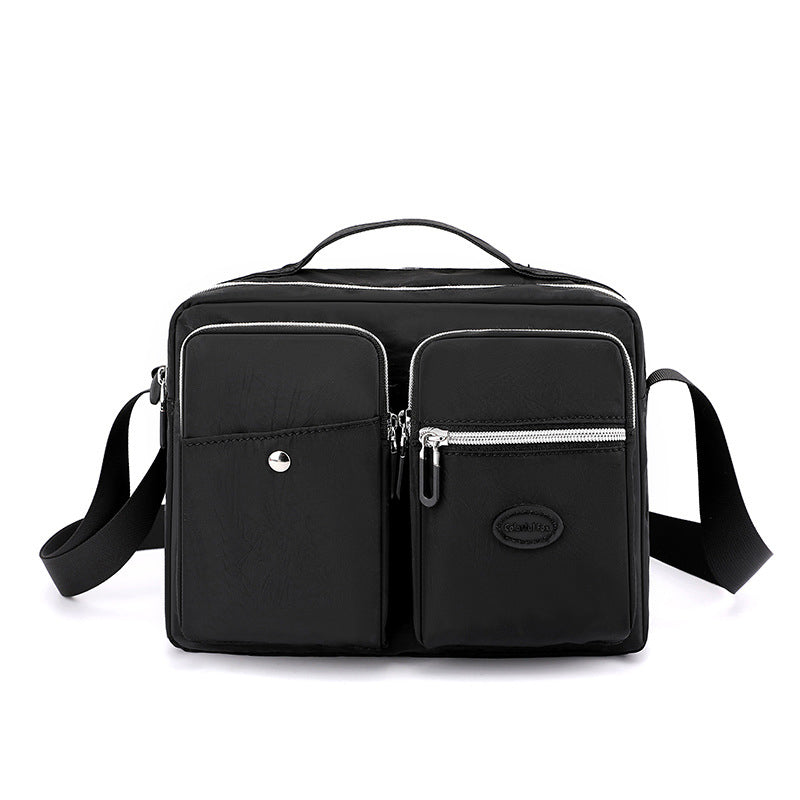 Organiseringsveske for damer; lett nylon messenger bag med mange funksjonelle rom.