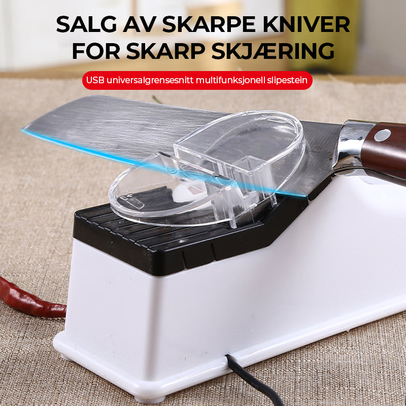 Hånd som fører kniv gjennom elektrisk knivsliper for skarpe kniver og tryggere matlaging.