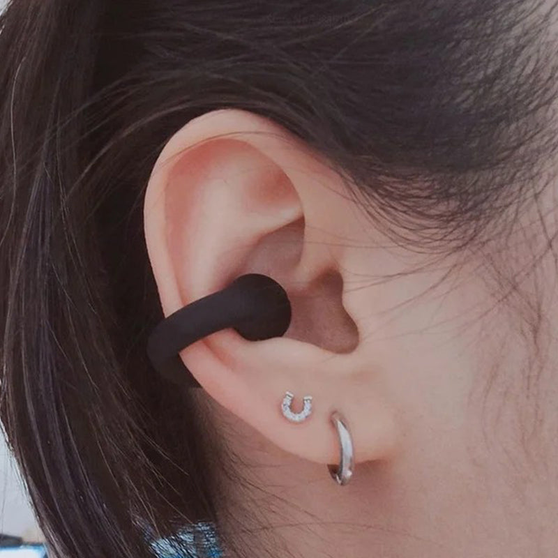 Ergonomiske trådløse øreklips hodetelefoner med benledning, ideelle for sport og aktiv bruk via Bluetooth.
