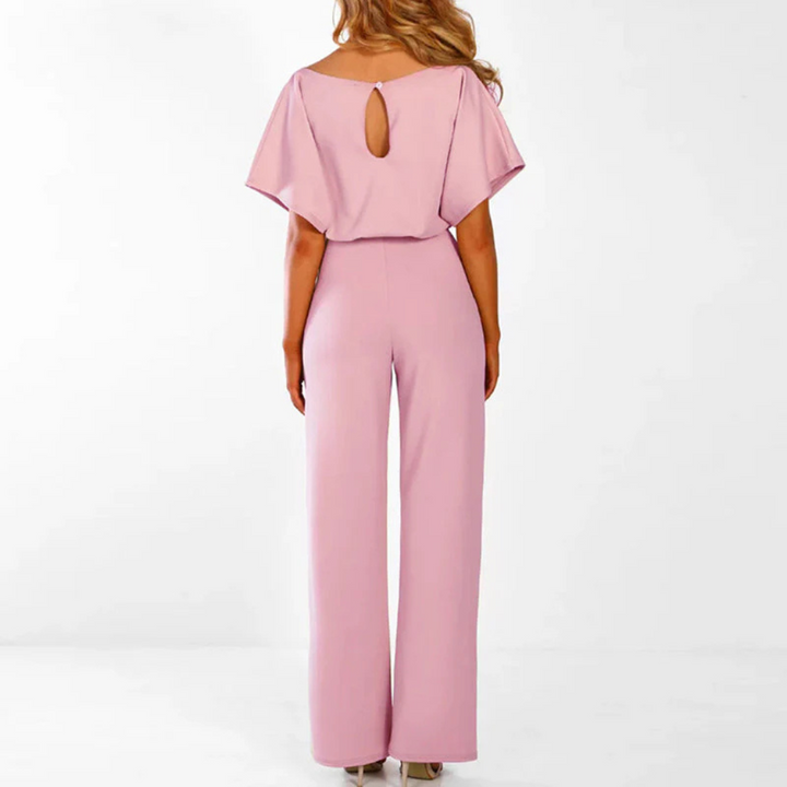 Elegant damejumpsuit. Komfortabel helårsstil perfekt for både sommer og vår, med vide ben for komfort.