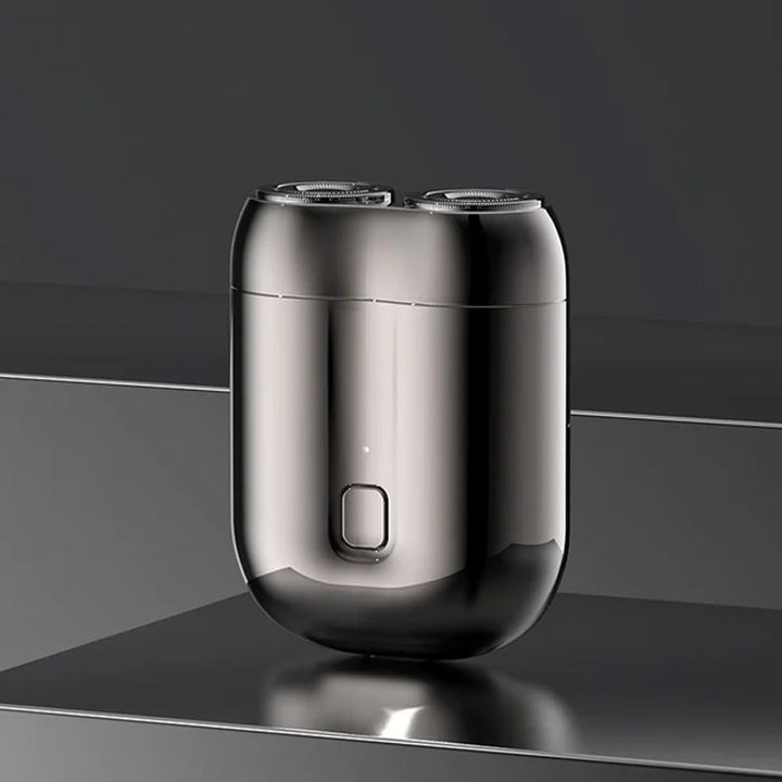 Kraftig kompakt elektrisk barbermaskin for menn, oppladbar og vanntett for effektiv personlig hygiene.