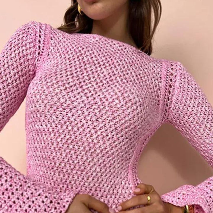 Komfortabel rosa polyester maxikjole. Myk, langermet strikkekjole for dame, ideell for hverdag og fest.