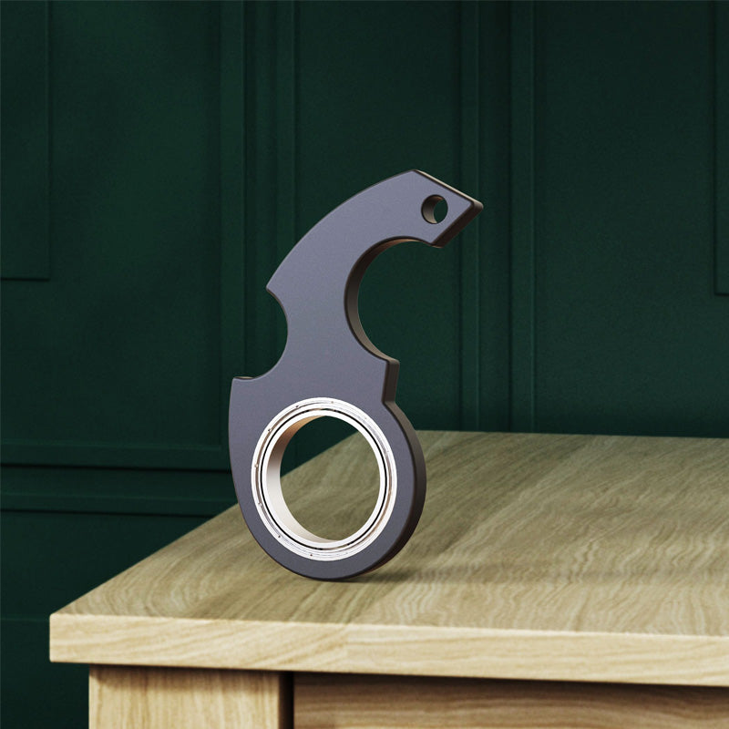 Fidget nøkkelring spinner i metall for stresslindring og økt fokus.