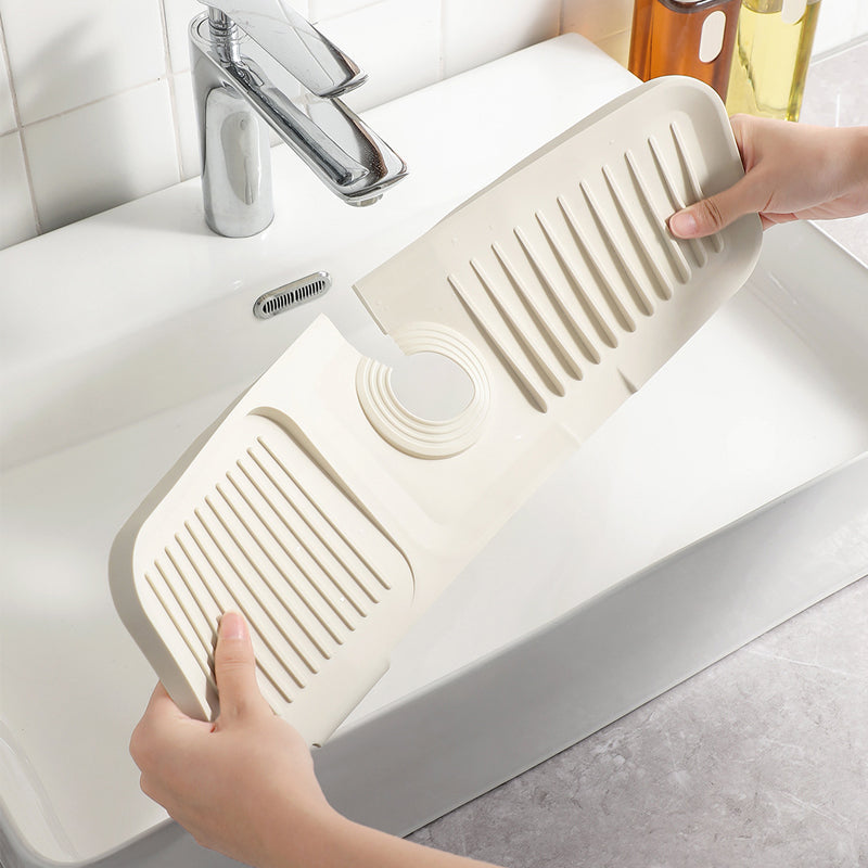 Sammenleggbar dreneringsmatte i silikon, perfekt for kjøkkenorganisering og enkel oppbevaring.