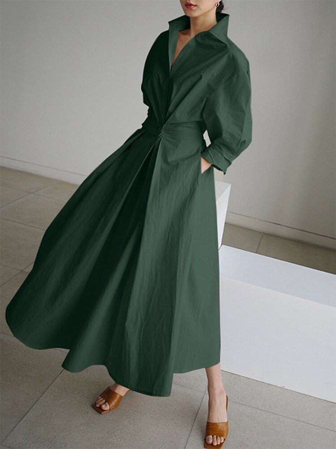 Beige sommerkjole dame. Komfortabel og elegant midikjole med knappmidje, ideell for varme dager.
