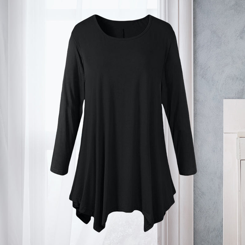 Elegant vårbluse for kvinner, ensfarget design med rund hals og lange ermer. Et tidløst hverdagsplagg.