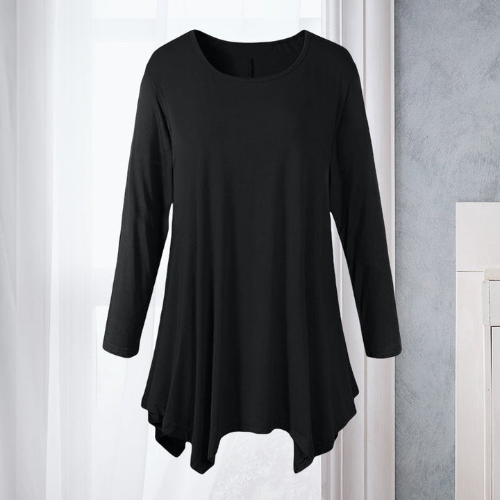 Elegant vårbluse for kvinner, ensfarget design med rund hals og lange ermer. Et tidløst hverdagsplagg.
