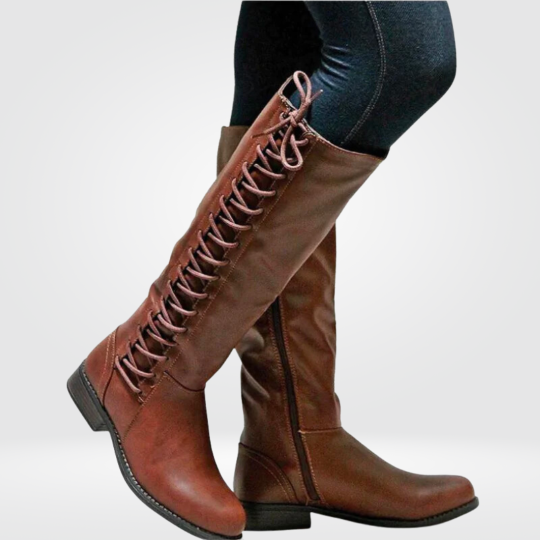 Elegante, høye dameboots i svart skinn. Komfortable kvinneboots for stil og daglig bruk hele året.