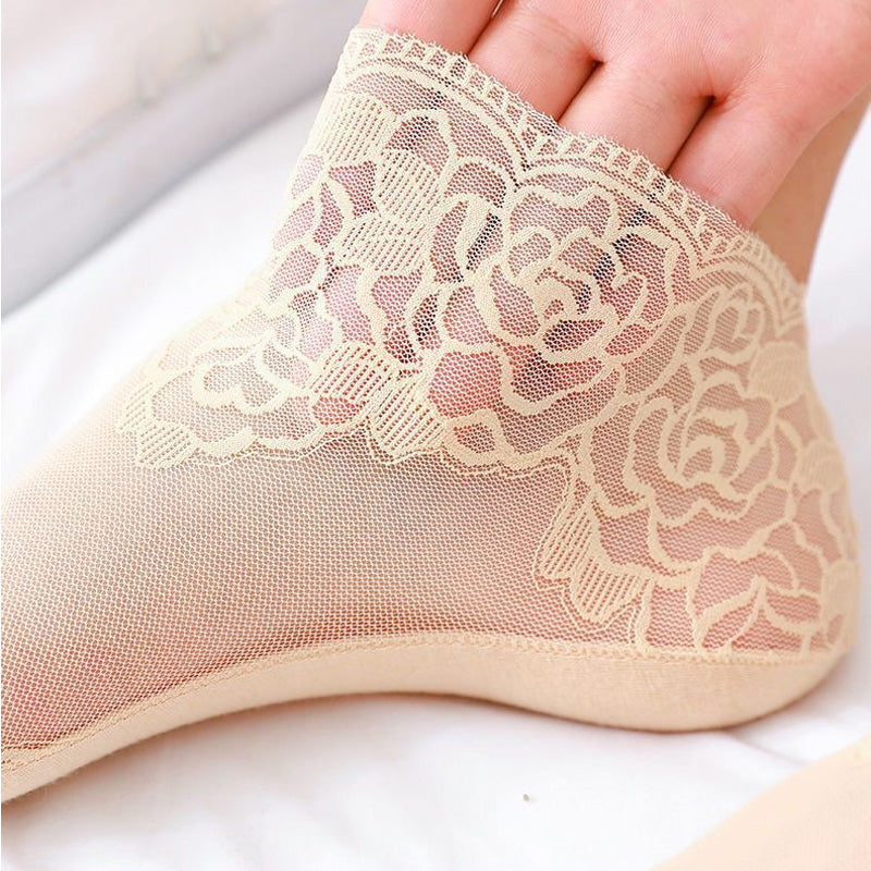 Elegante blondesokker for kvinner med rosedetaljer, perfekt mote tilbehør for sommer.