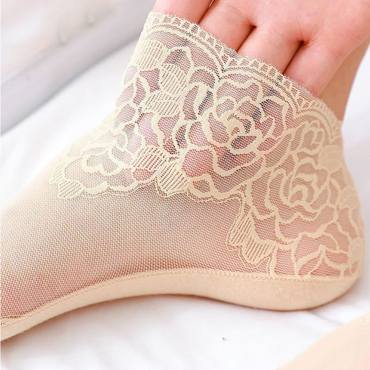 Elegante blondesokker for kvinner med rosedetaljer, perfekt mote tilbehør for sommer.