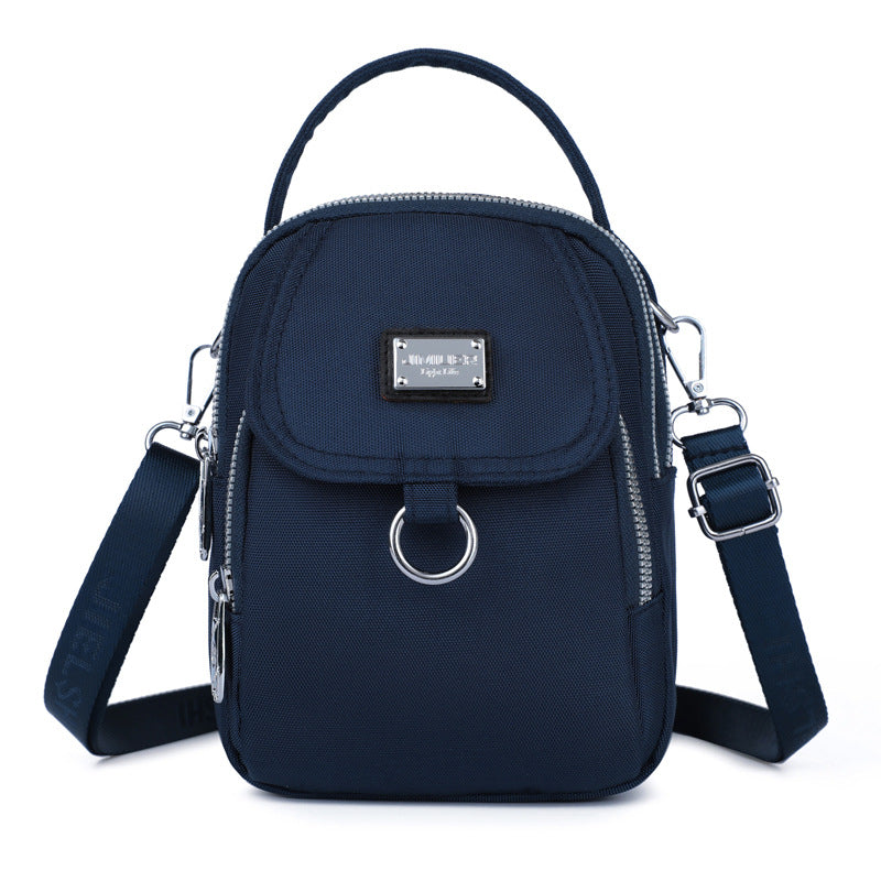 Vanntett og praktisk hverdagsveske for kvinner, en allsidig crossbody-løsning.