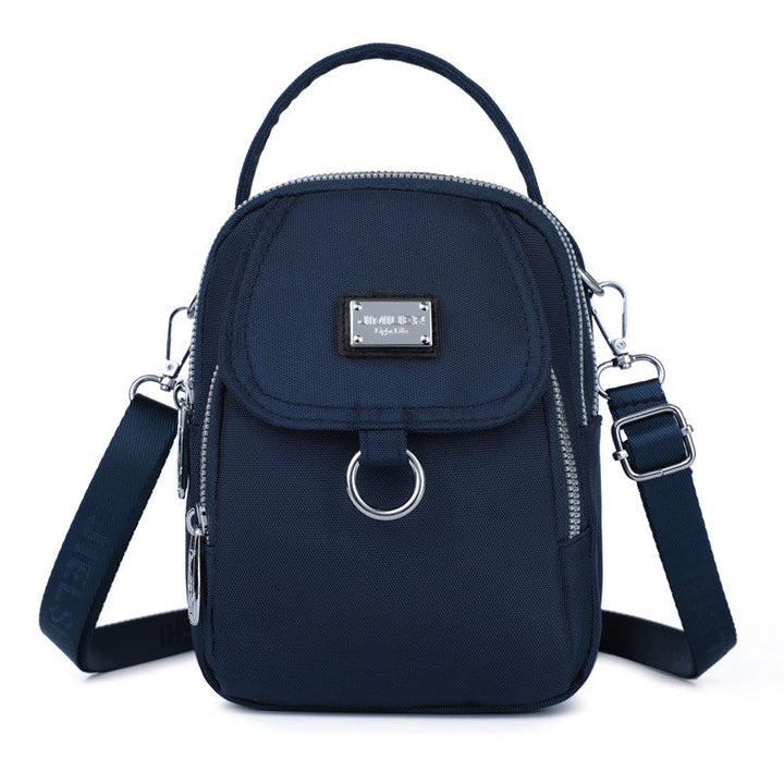 Vanntett og praktisk hverdagsveske for kvinner, en allsidig crossbody-løsning.