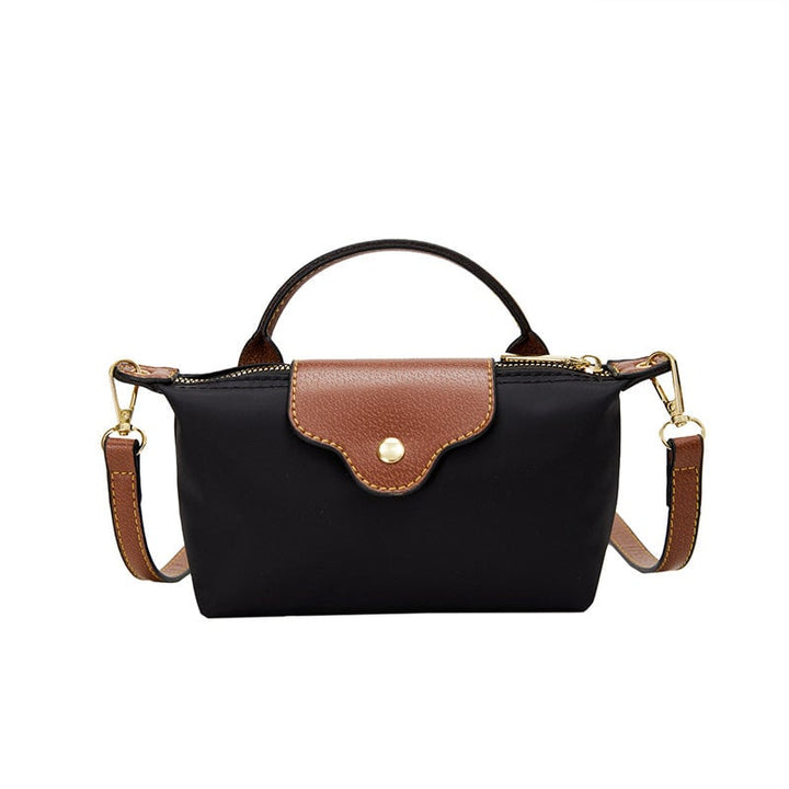 Hverdagsvennlig fargeblokk miniveske, trendy crossbody i nylon for en aktiv livsstil.