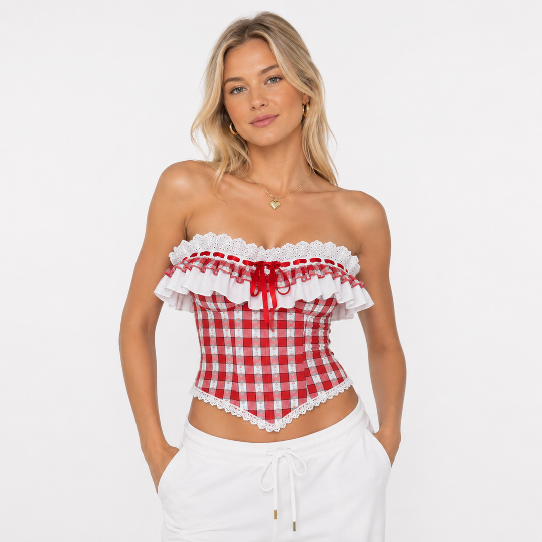 Rutete rød stroppeløs korsettopp til dame med elegant blondekant. Perfekt sommertopp for fest og ferie.