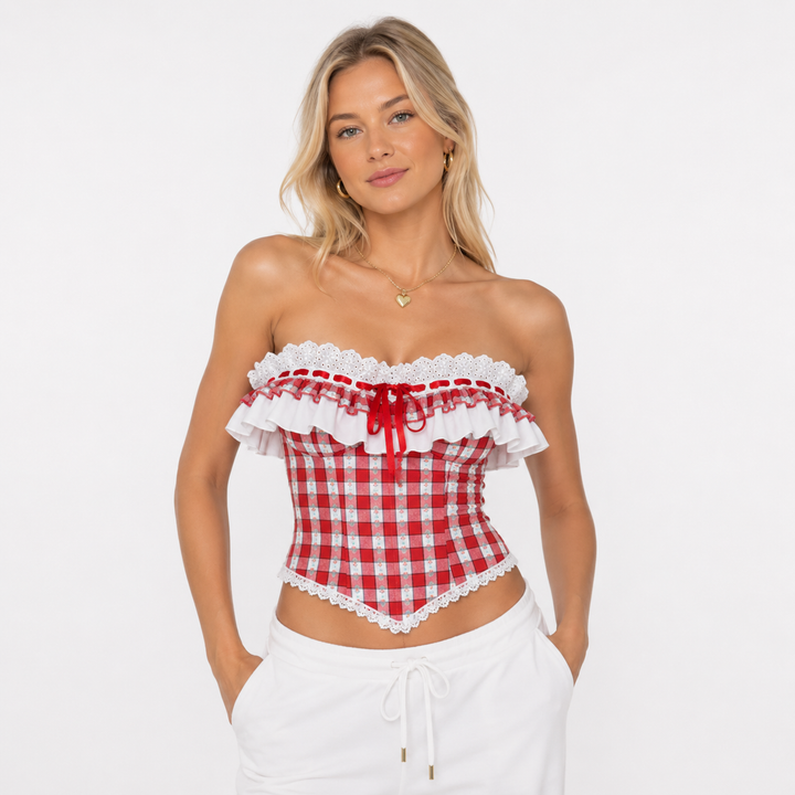 Rutete rød stroppeløs korsettopp til dame med elegant blondekant. Perfekt sommertopp for fest og ferie.