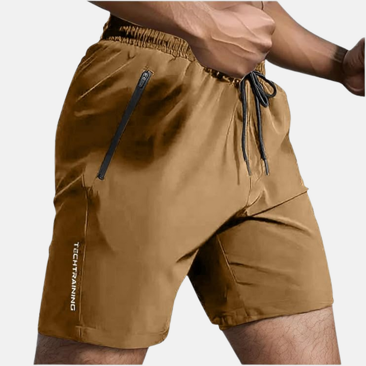Sportsshorts for menn og kvinner. Hurtigtørkende materiale holder deg kjølig under trening og jogging.