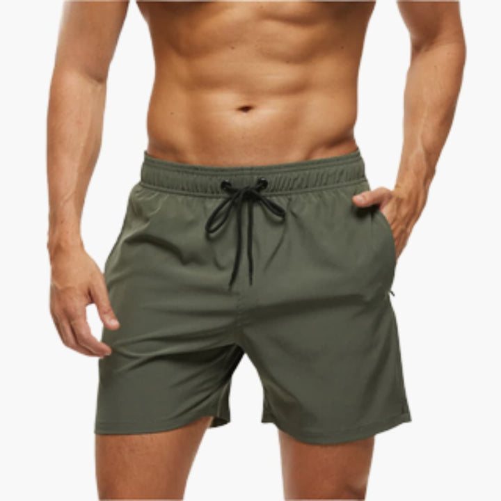 Lettvekts herre svømmebukser med snor, løs passform, perfekt for strand og sommer.