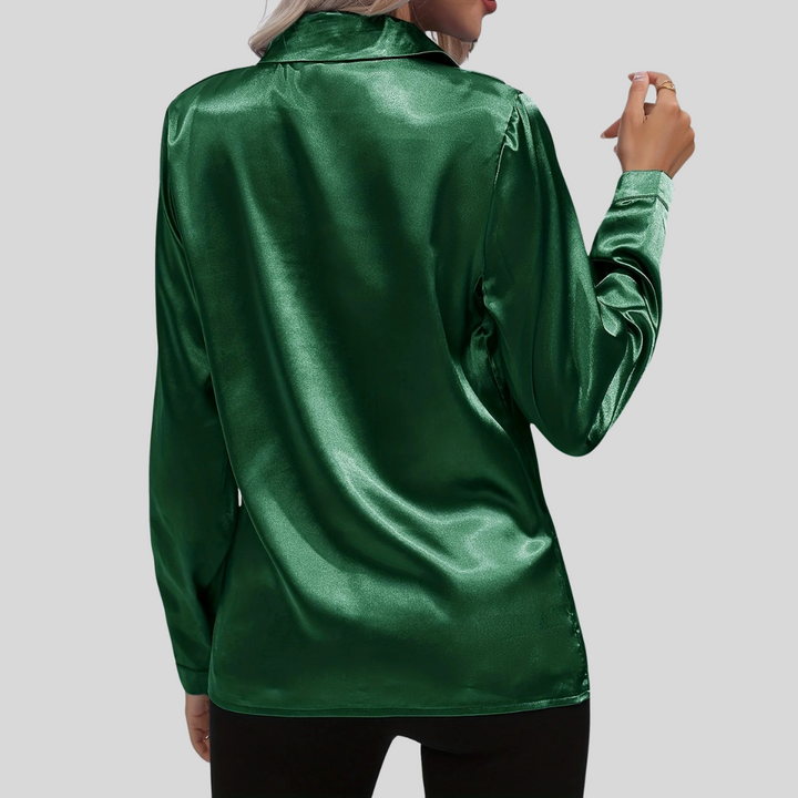 Stilig langermet damebluse, ideell for en allsidig og elegant look. Perfekt for mote.