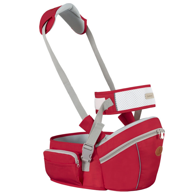 Mørkeblå bæresele med ryggstøtte, sikrer ergonomisk komfort for foreldre og baby.