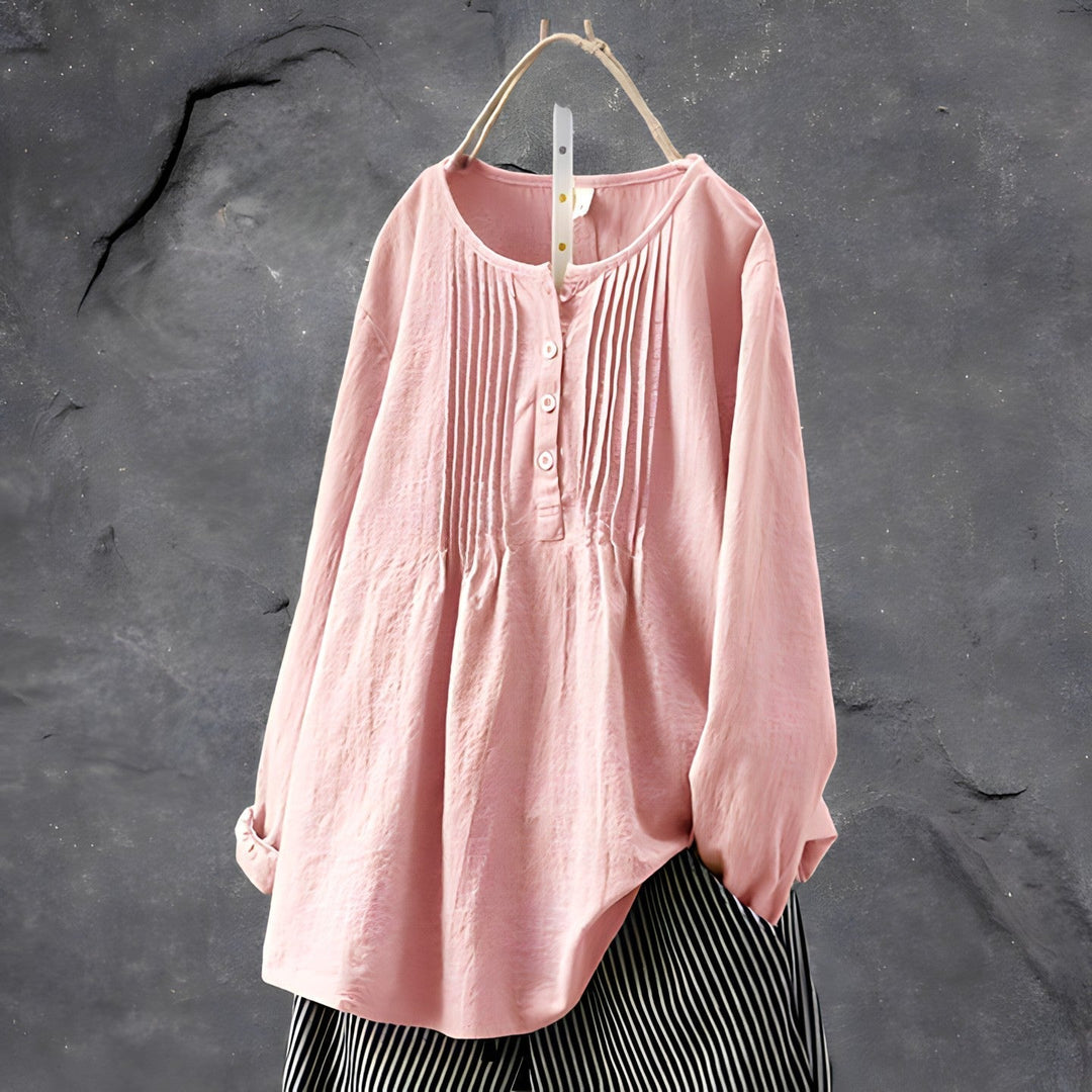 Stilren og komfortabel håndlaget damebluse med løs passform. Perfekt sommerbluse for hverdagsstil.