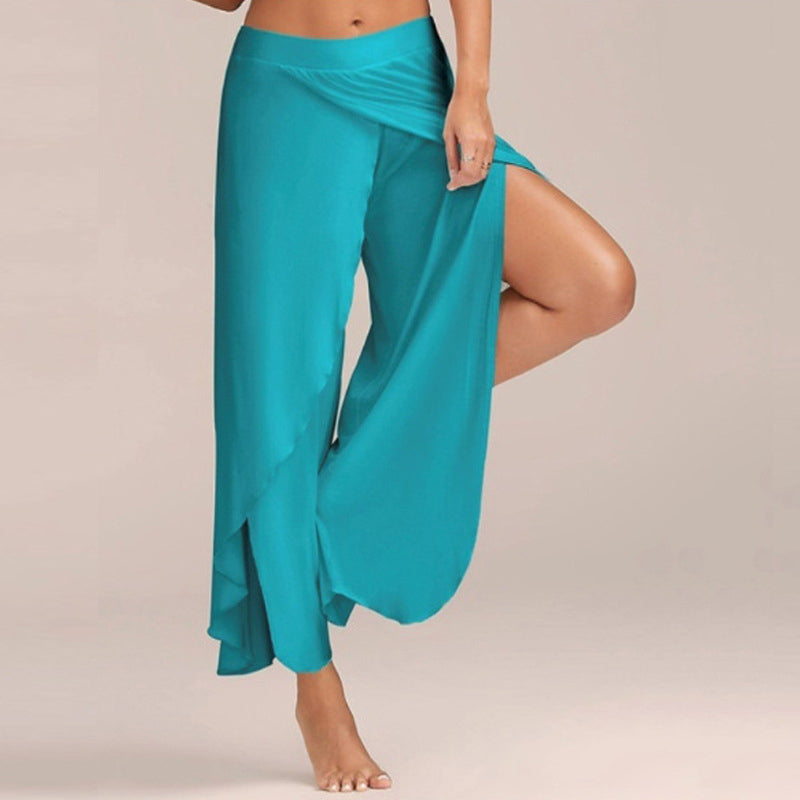 Svart yogabukse for kvinner. Brede ben, elegant kryssdesign, ideell for daglig bruk og yoga.