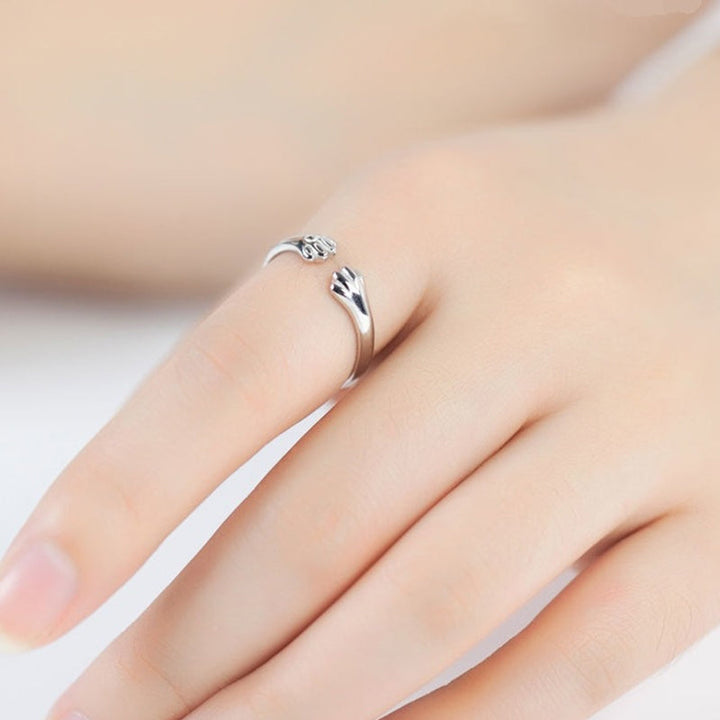 Søt dyrepoteavtrykk ring, justerbar og unisex. Et sjarmerende smykke i legering for kjæledyrelskere.