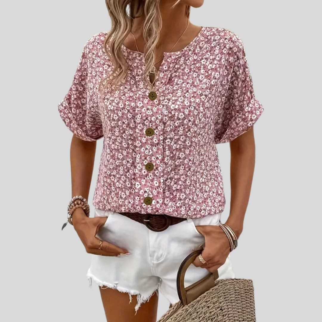 Blomstrete sommertopp for kvinner med knapper, ideell for ferie og hverdag. Elegant, lett og mønstret design.