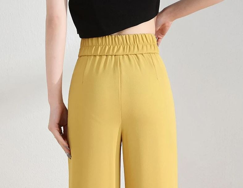 Pustende og antistatiske polyester damebukser. Komfortable løse bukser med brede ben for sommer.