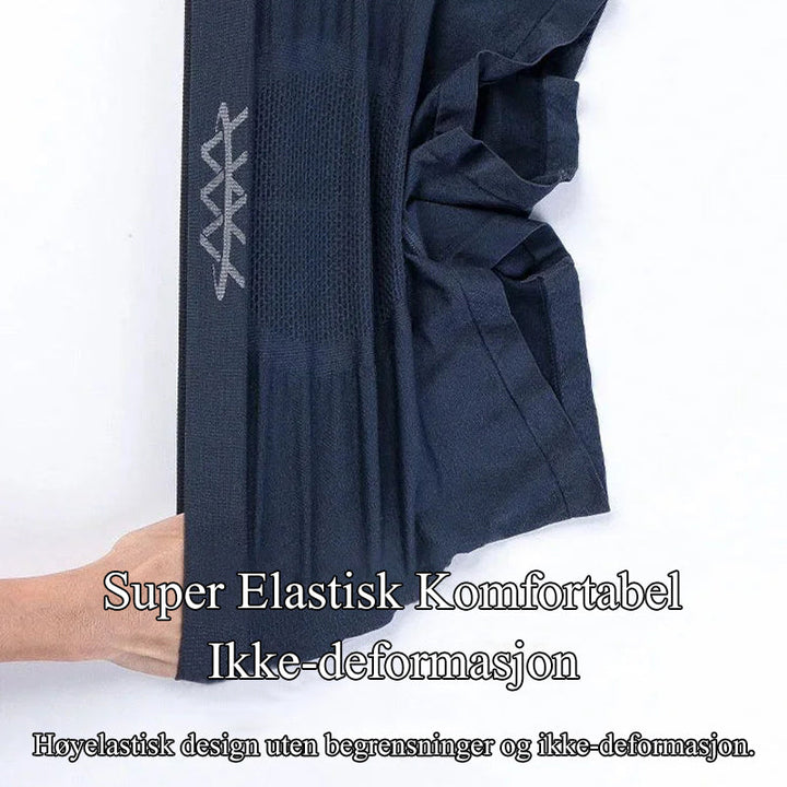 Elastiske grå 5D magnetiske herretruser som gir suveren komfort, pusteevne og velvære.