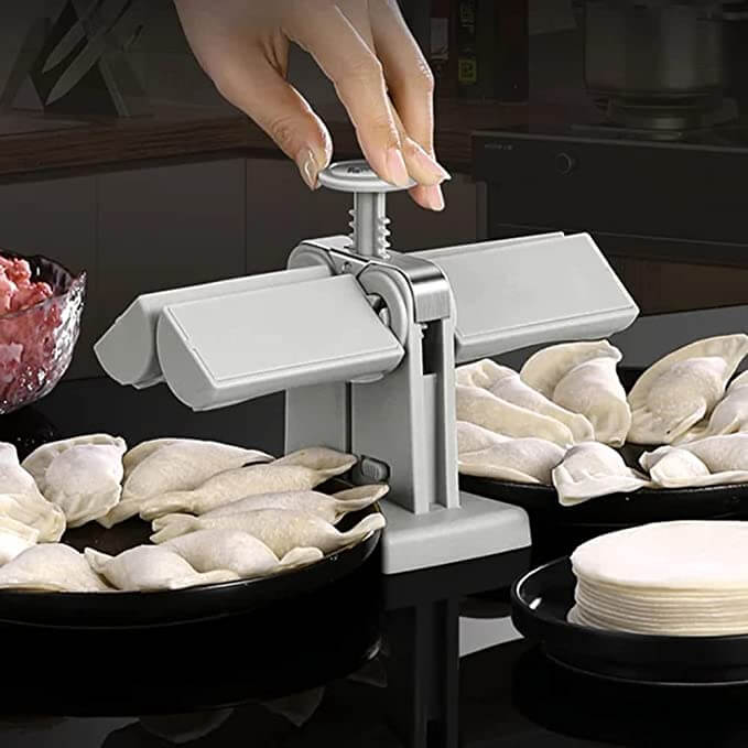 Automatisk maskin som forenkler prosessen med å lage dumplings, perfekt for hurtigmat og kjøkkenutstyr.