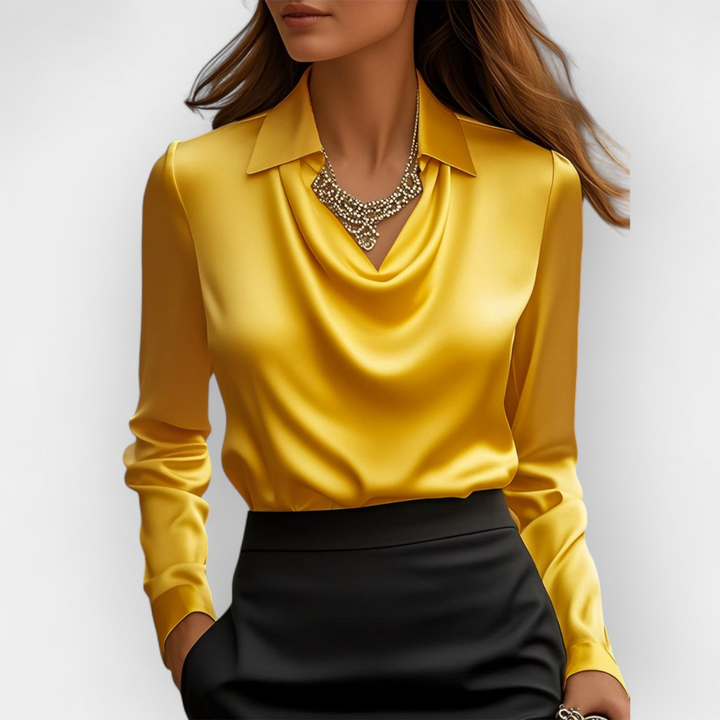 Ny damebluse med avslappet passform, elegant vannfallskrage og lange ermer for moderne stil.